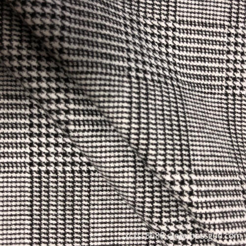 Jacquard stickat plaggetyg